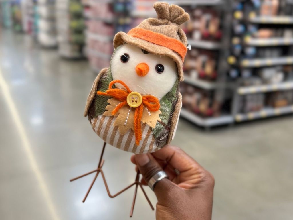A 7" fabric bird dressed in Fall décor 