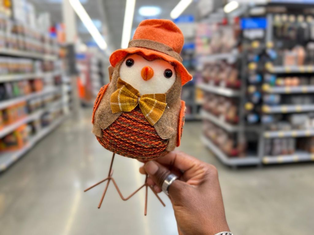 A 7" fabric bird dressed in Fall décor 