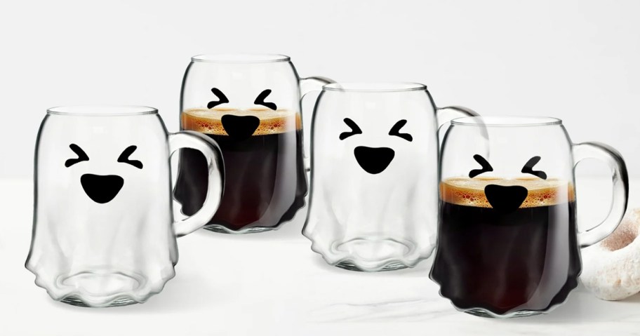 set of glass ghost mugs with squinting faces