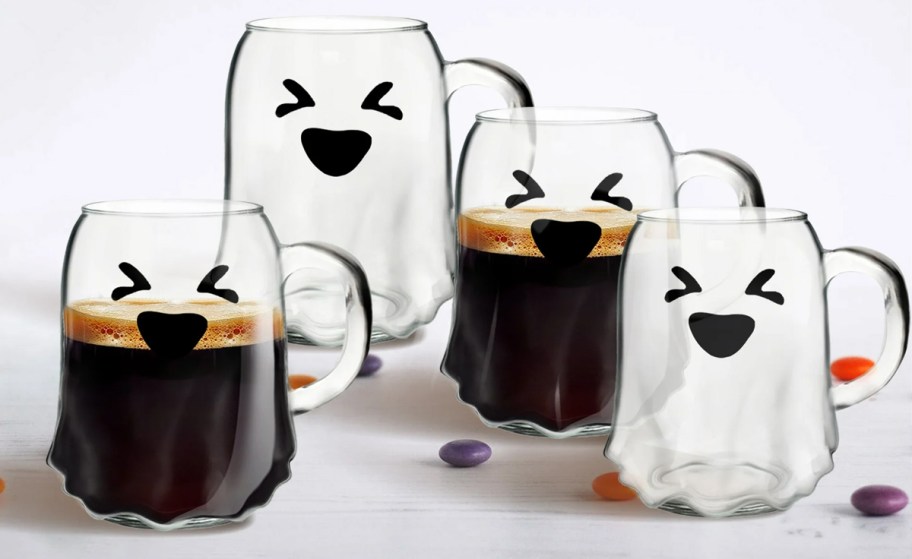 set of glass ghost mugs with squinting faces