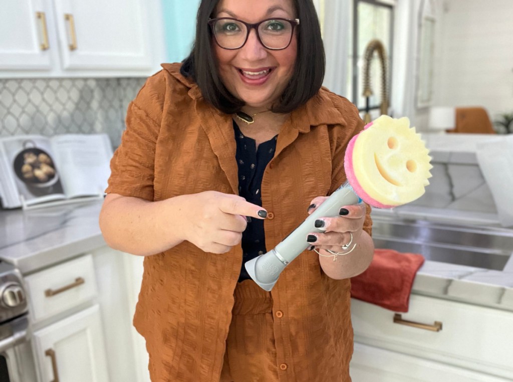 Lina holding a Scrub Daddy for the QVC Livestream event
