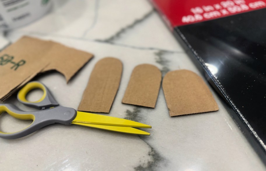 cardboard shapes like ghosts