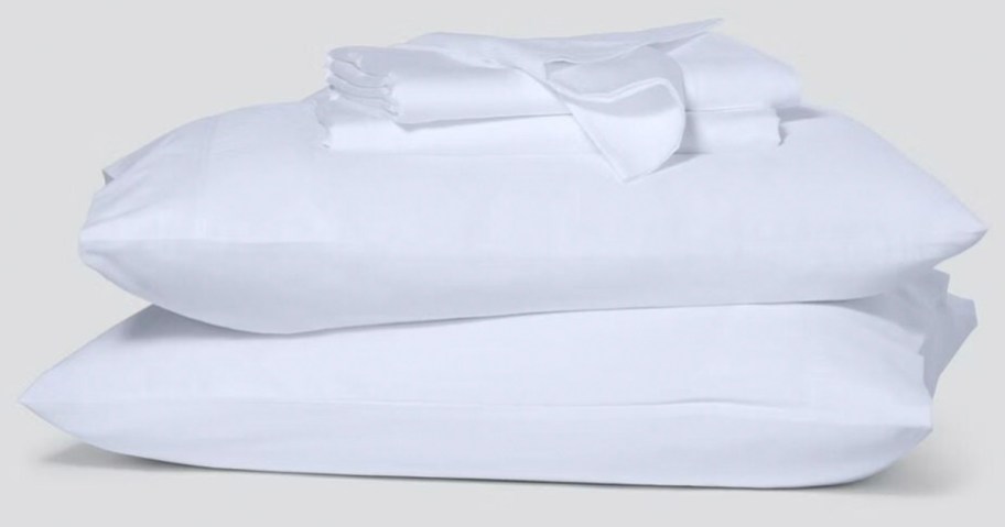 white sheets and two pillows