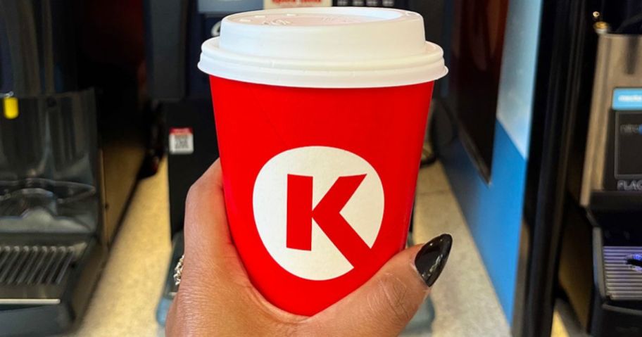 Hand holding a small Circle K coffee