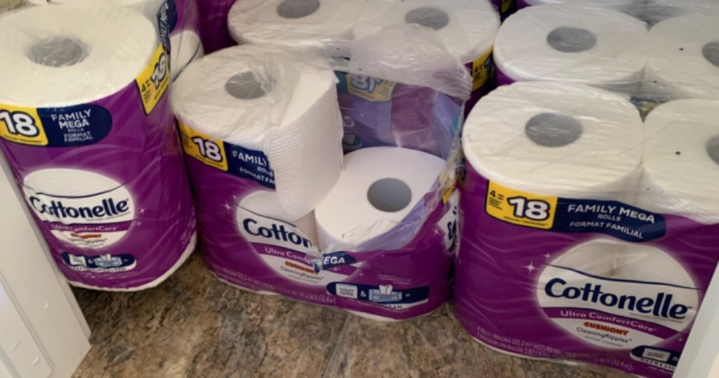 rolls of toilet paper on closet floor