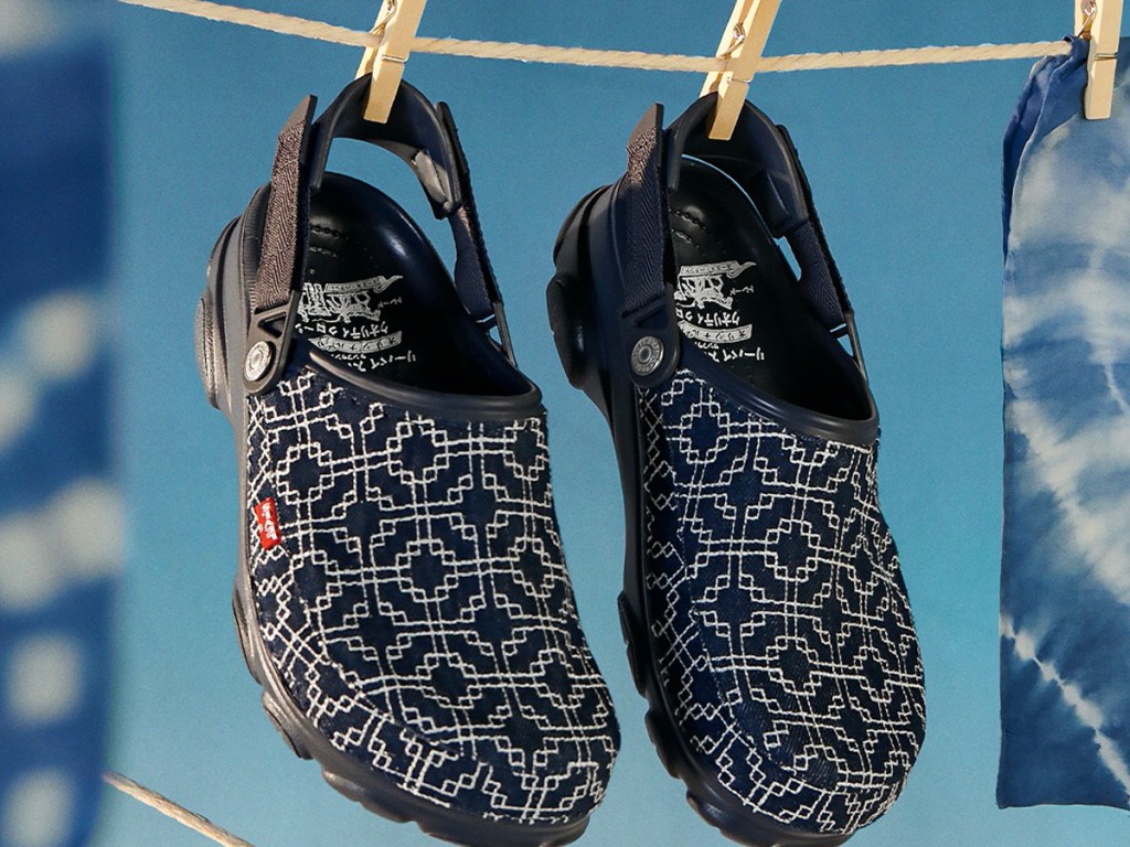 blue levis crocs hanging off clothes line