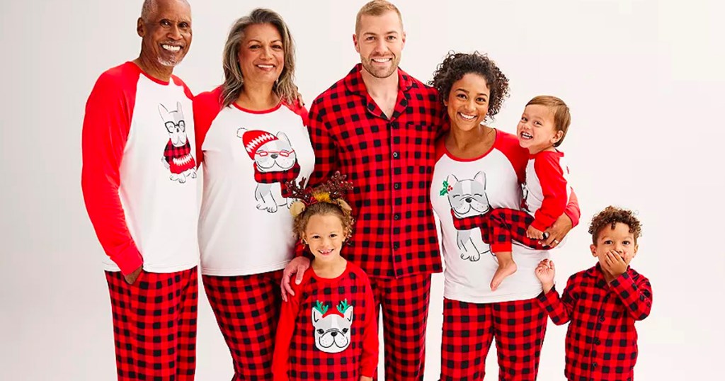 family wearing black and red frencie pajamas