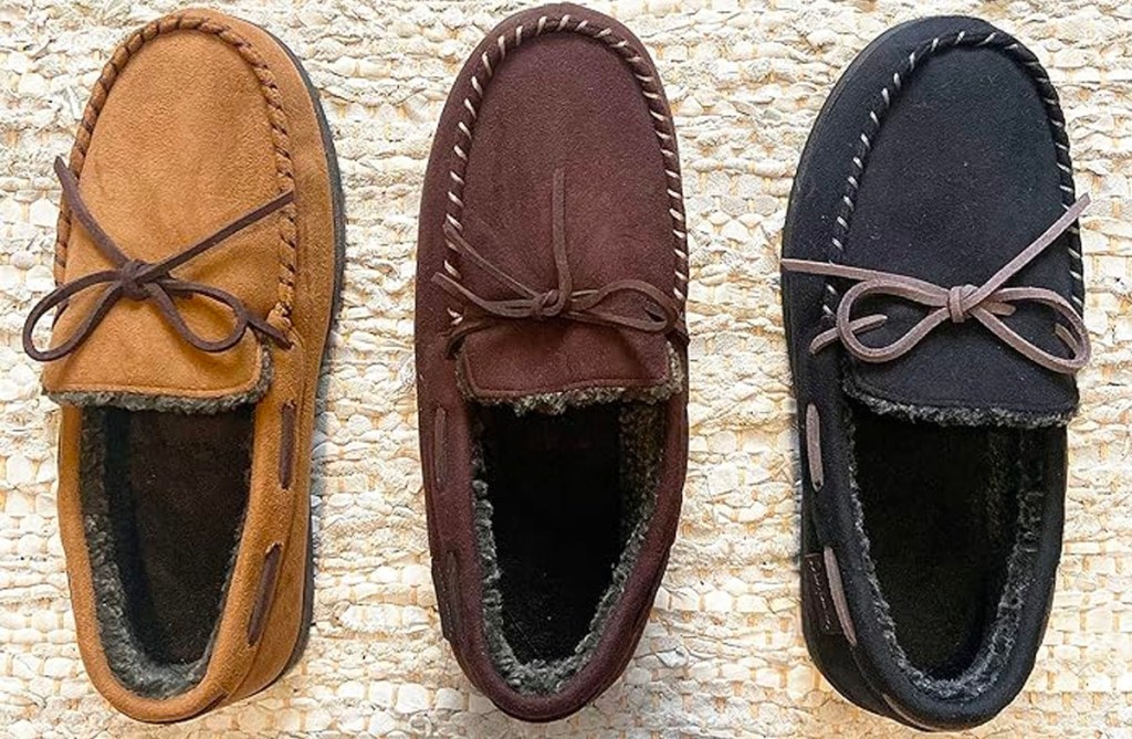 three dearfoam mocassin slippers in tan, brown, and black