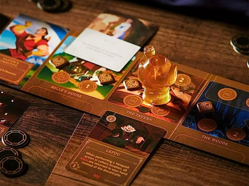disney villainous boardgame pieces on table