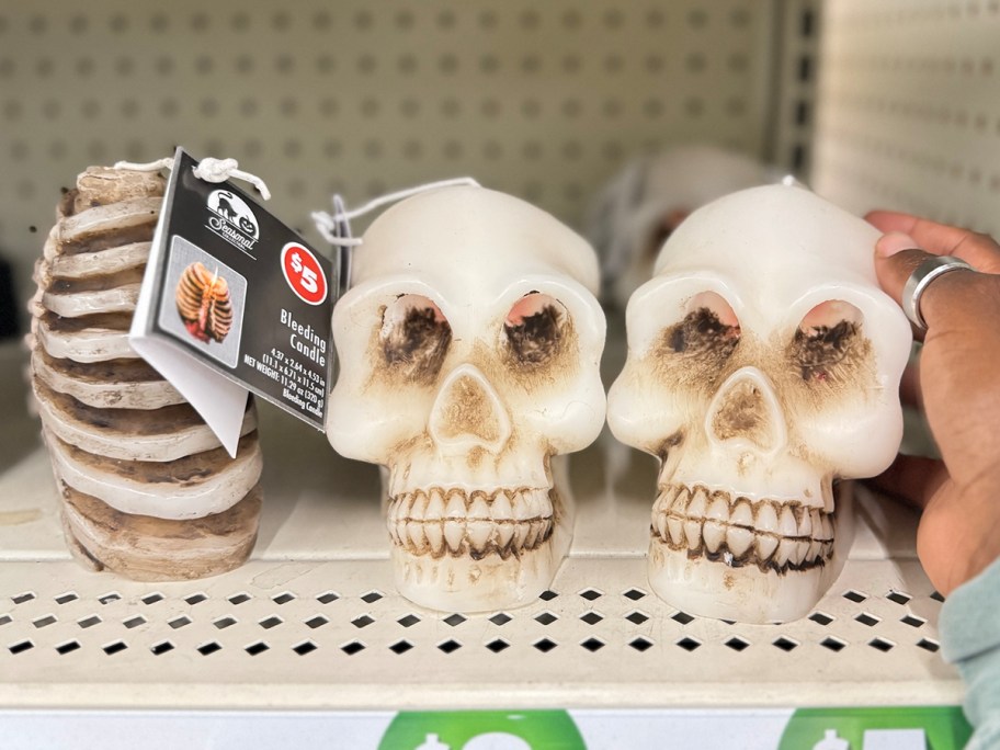 skull bleeding candles on shelf