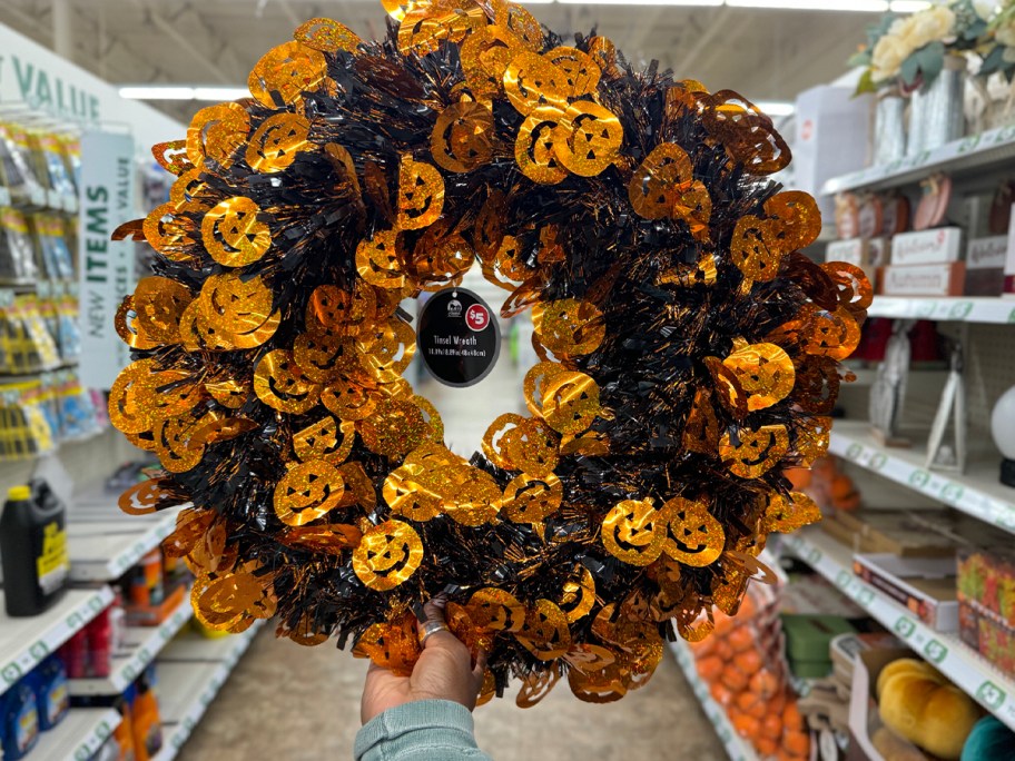 orange and black tinsel wreath 