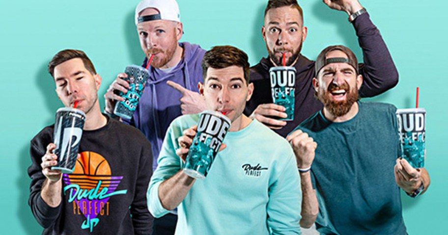5 men drinking dude perfect smoothies out of cups