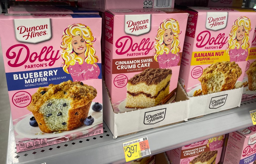 duncan hines dolly parton blueberry muffin, crumb cake, and banana nut muffin mix on shelf