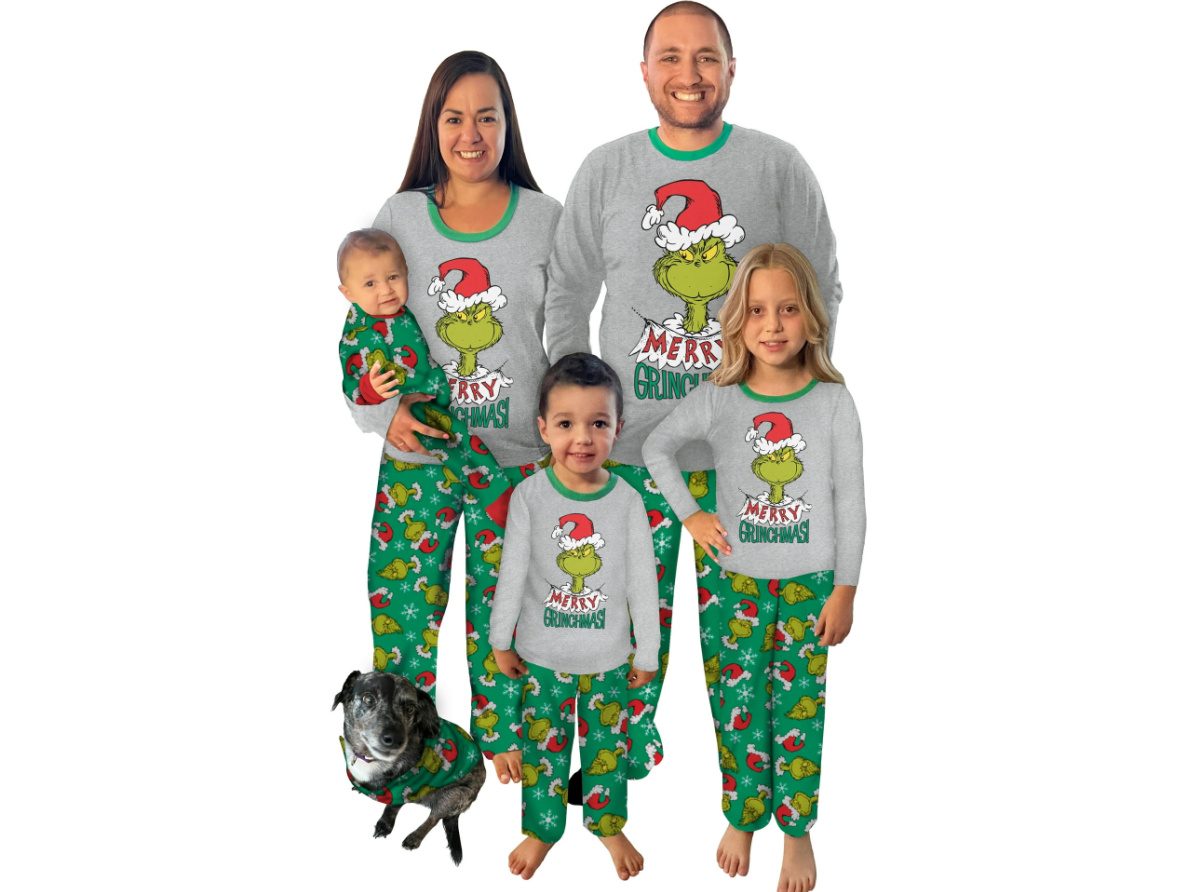 family wearing grinch pajamas
