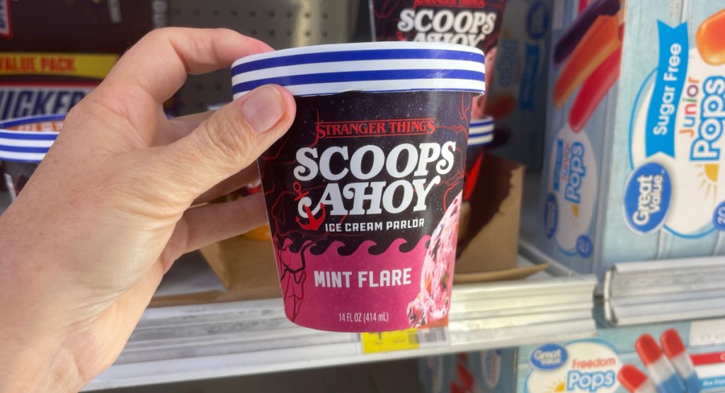 hand holding Scoops Ahoy Ice Cream in mint flare at the store