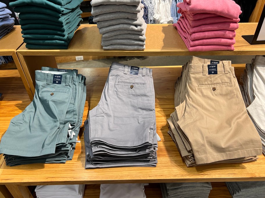 three jcrew mens shorts on display in store