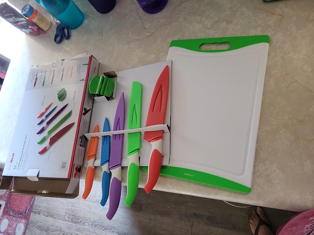 knife set and cutting board on counter 