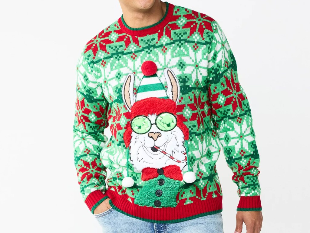 man wearing a kohl's christmas sweater with a llama on it