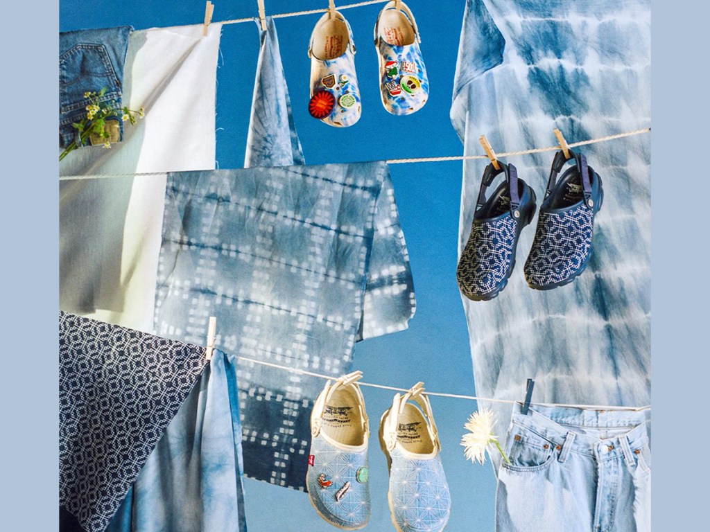 levi crocs hanging on clothes lines with jeans