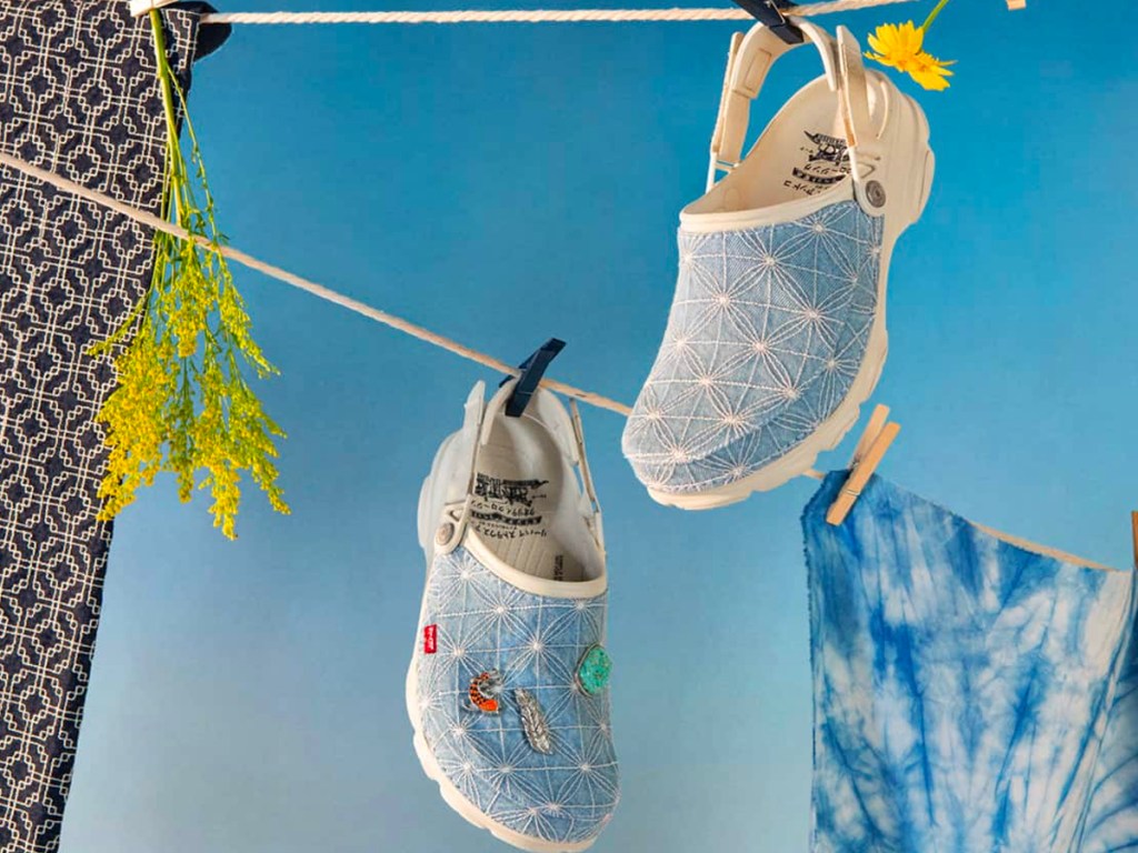 blue levis crocs hanging off clothes line