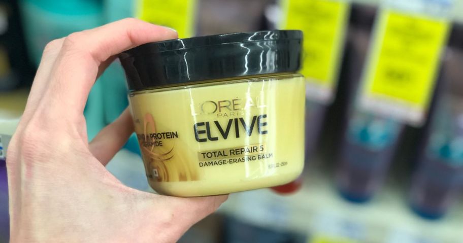 L'Oreal Elvive product in hand in store