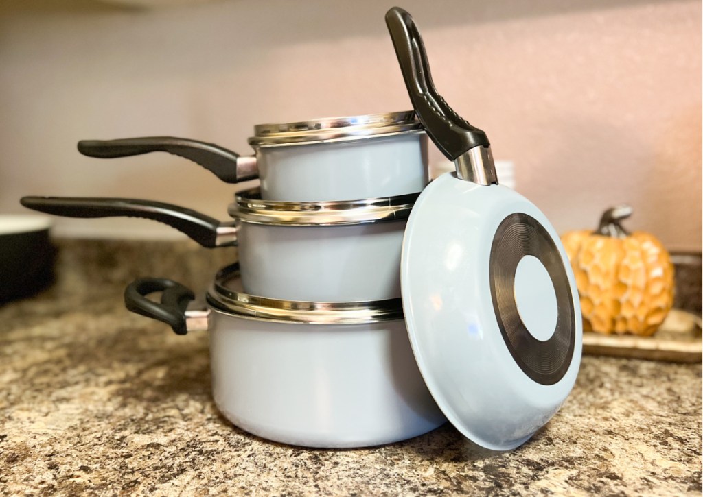 light blue cookware stacked 