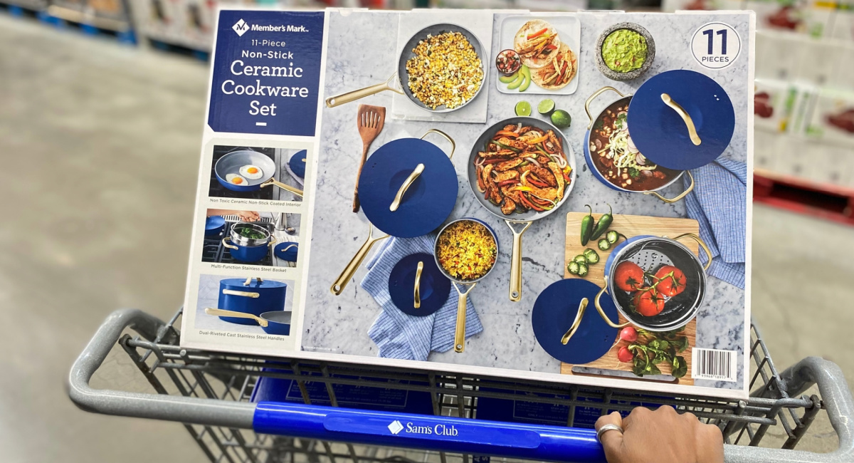 https://hip2save.com/wp-content/uploads/2023/09/members-mark-ceramic-cookware-set-in-blue-inside-of-sams-club-cart-with-hand-push-it.jpg