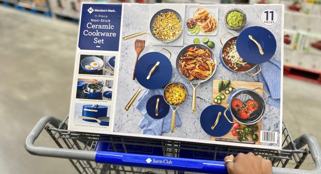 members mark ceramic cookware set in blue inside of sams club cart with hand push it