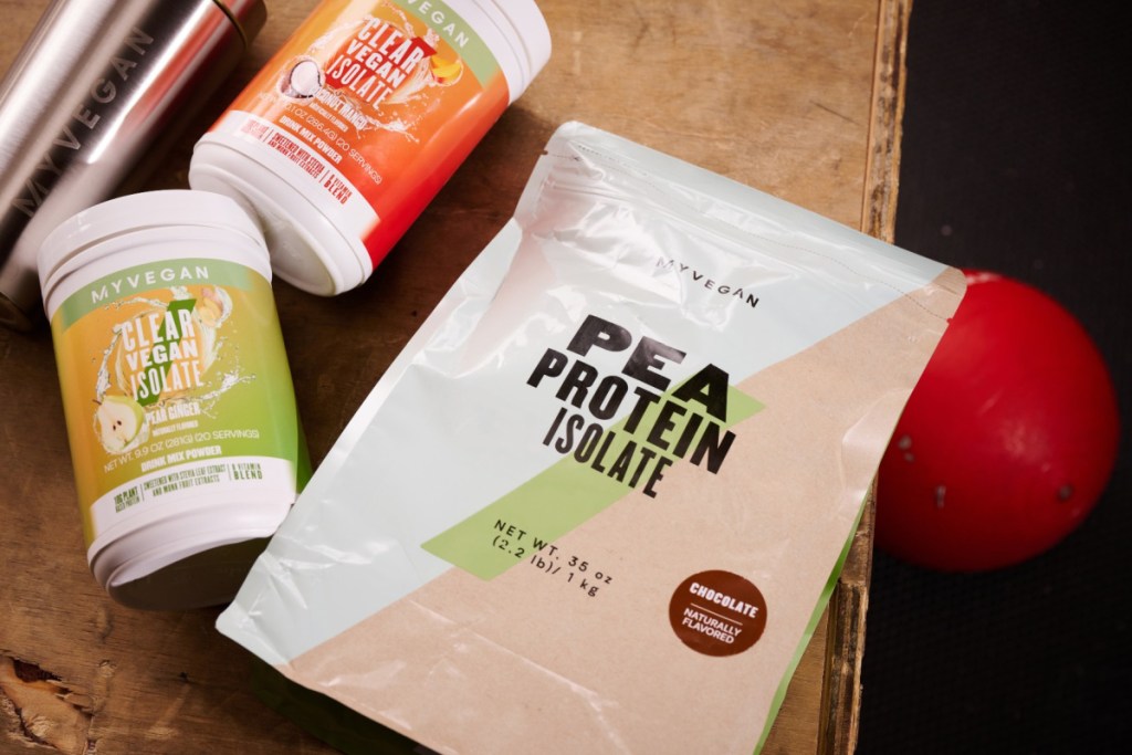 bag of pea protein next to other healthy snacks