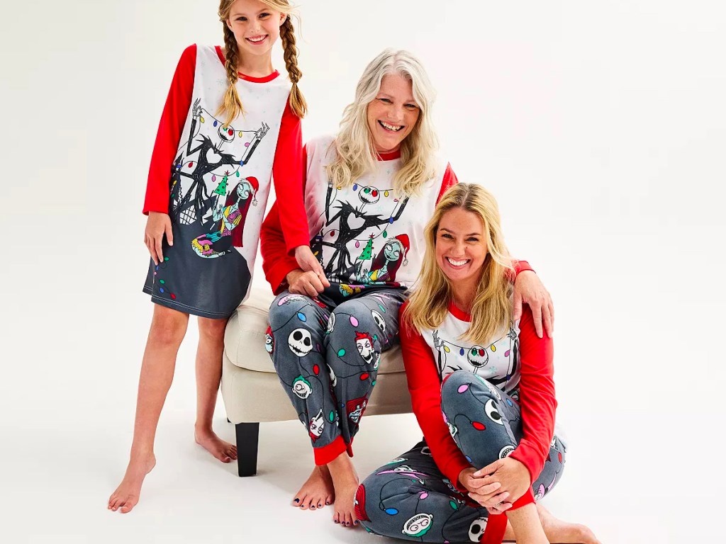 two women and child wearing nightmare before christmas pajamas