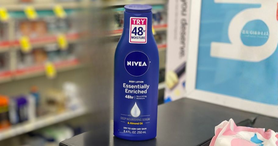 NIVEA Essentially Enriched Body Lotion 8.4oz on counter in store