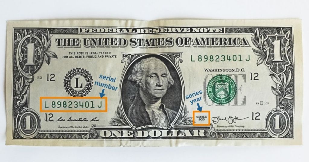 dollar bill with serial number and series year highlighted