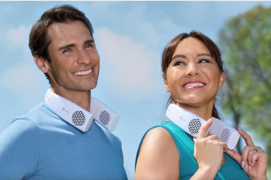 man and woman wearing portable neck fans