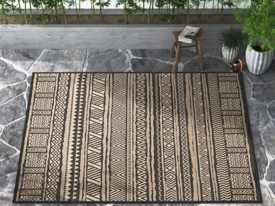 black and tan area rug outdoors
