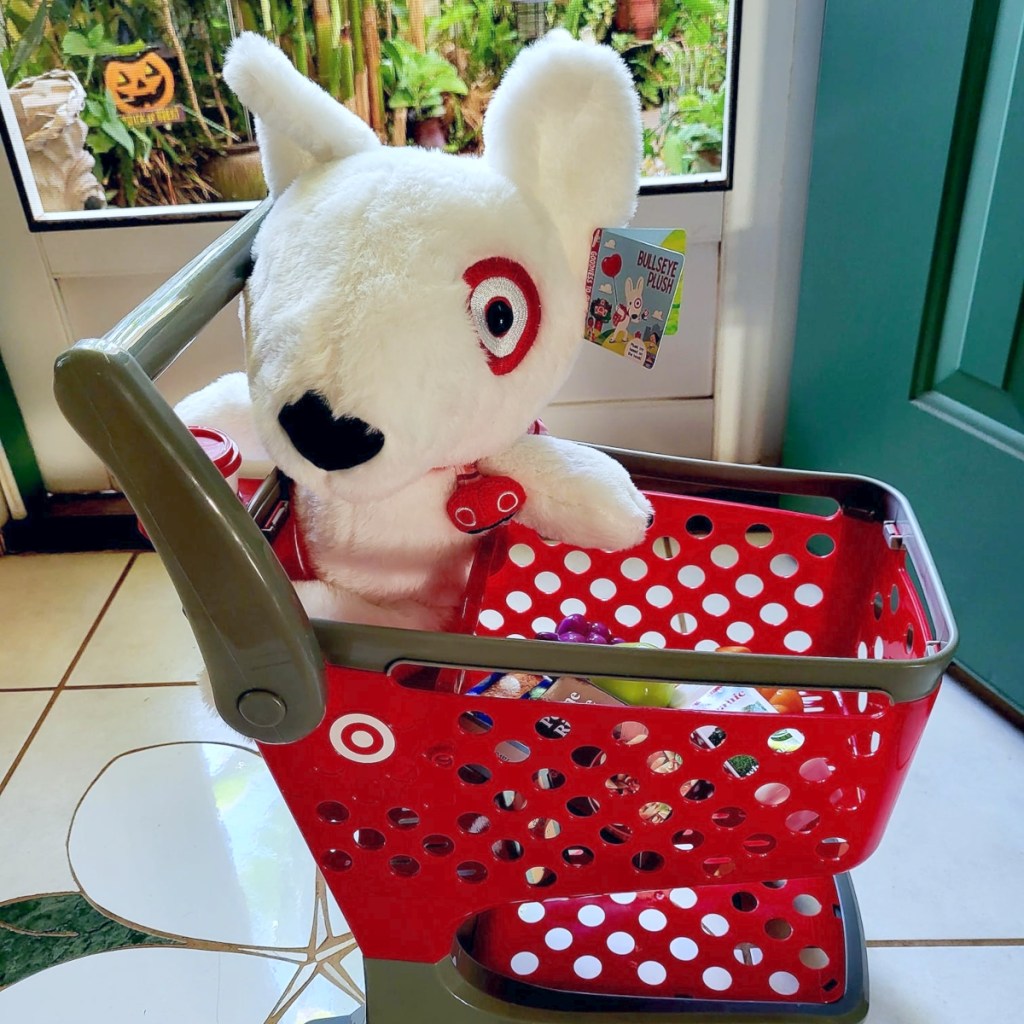 plush white dog in toy Target shopping cart