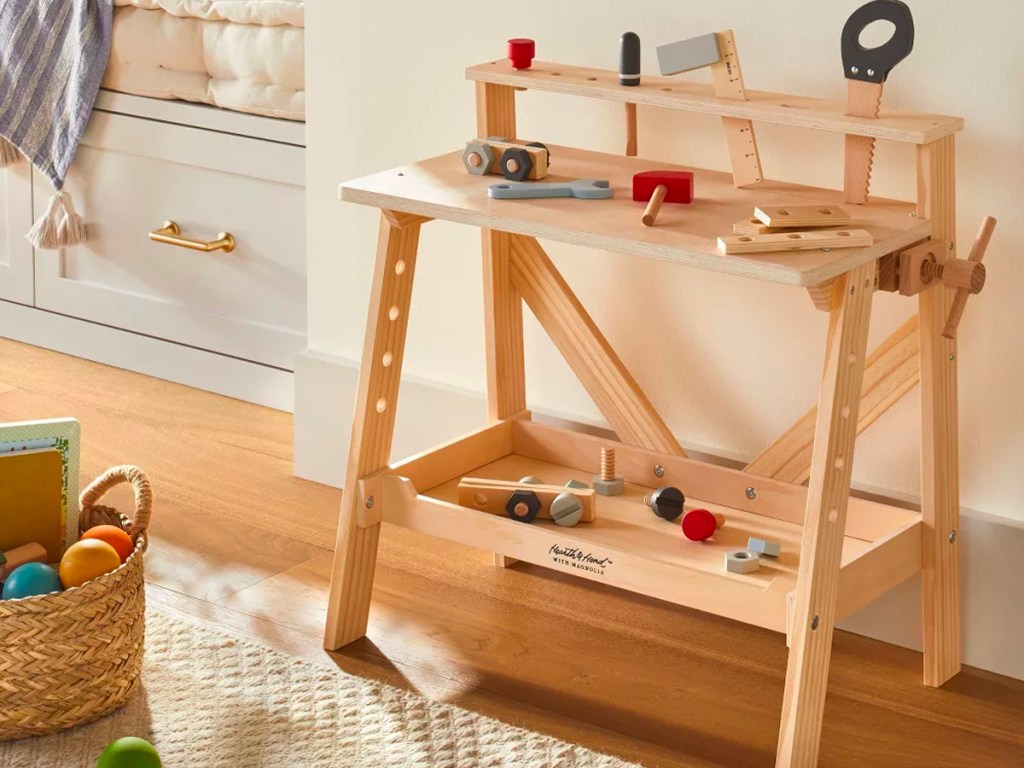 wooden toy toolbench playset in living room