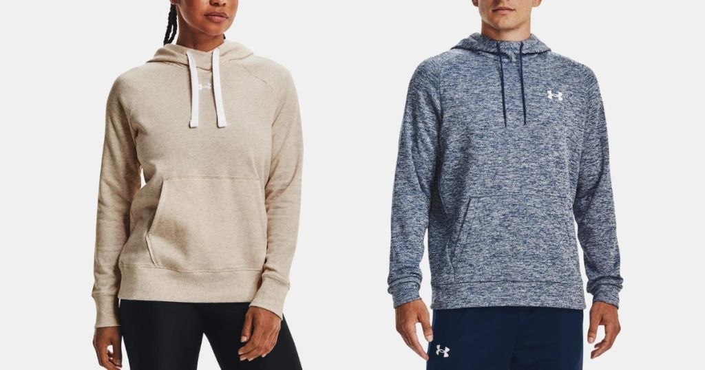 woman wearing tan Under Armour hoodie and man wearing blue under armour hoodie