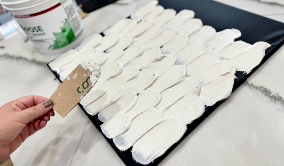 using cardboard and joint compound to make wall art