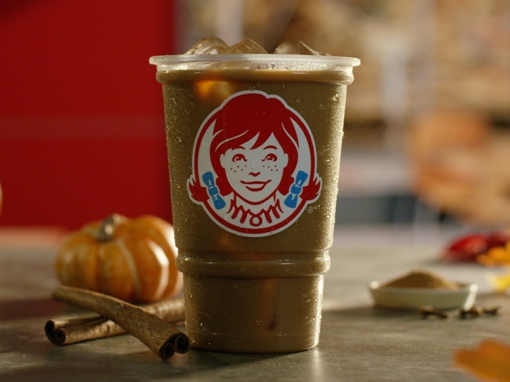 cold brew coffee in Wendy's cup with fall decor