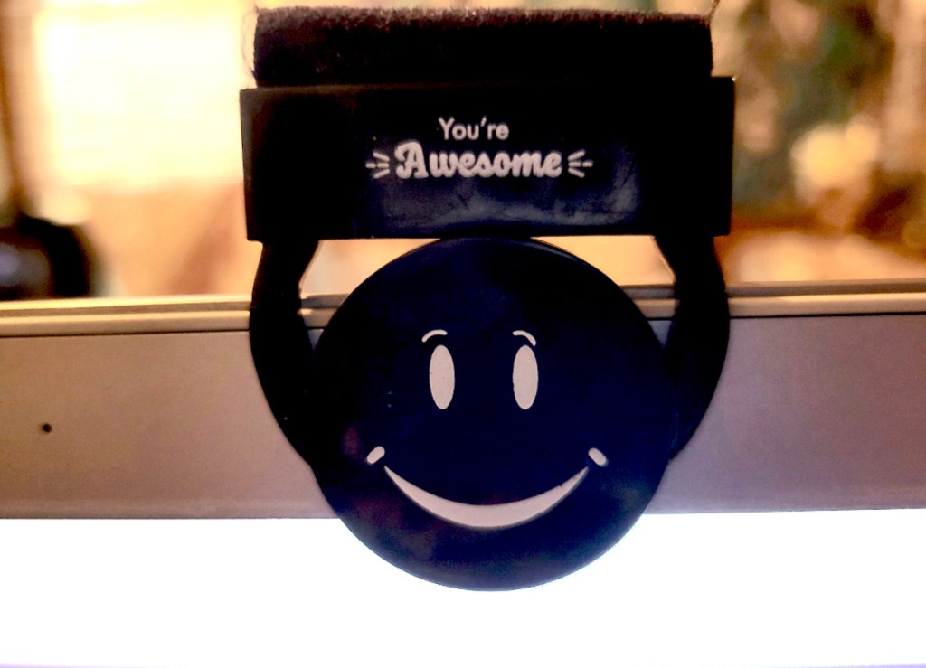 black you're awesome smiley face cam cover on laptop
