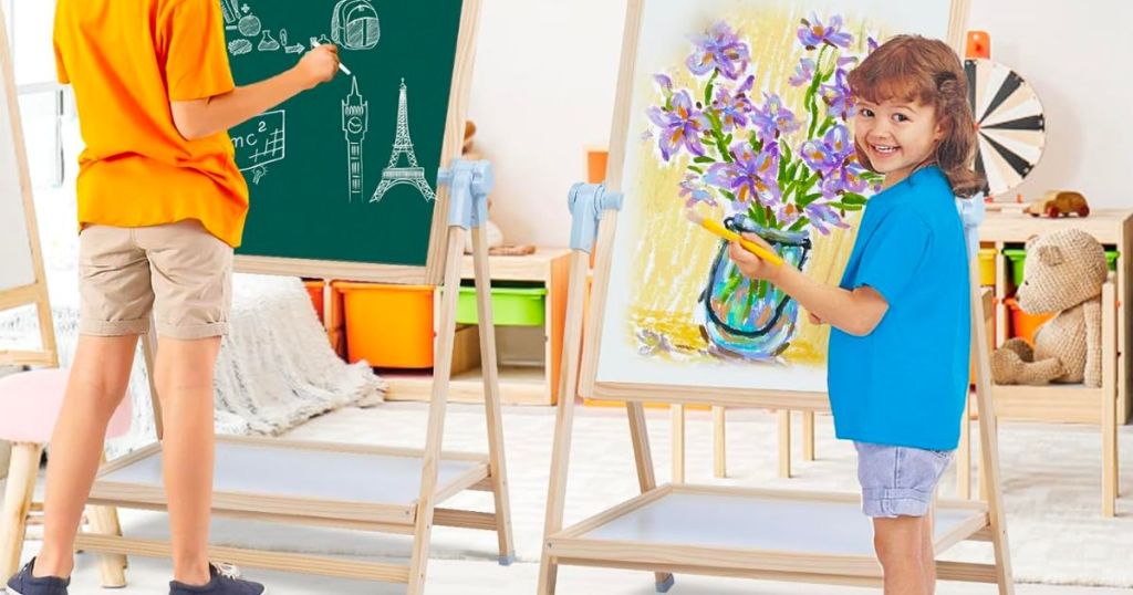 a little girl using a 4n1 easel 