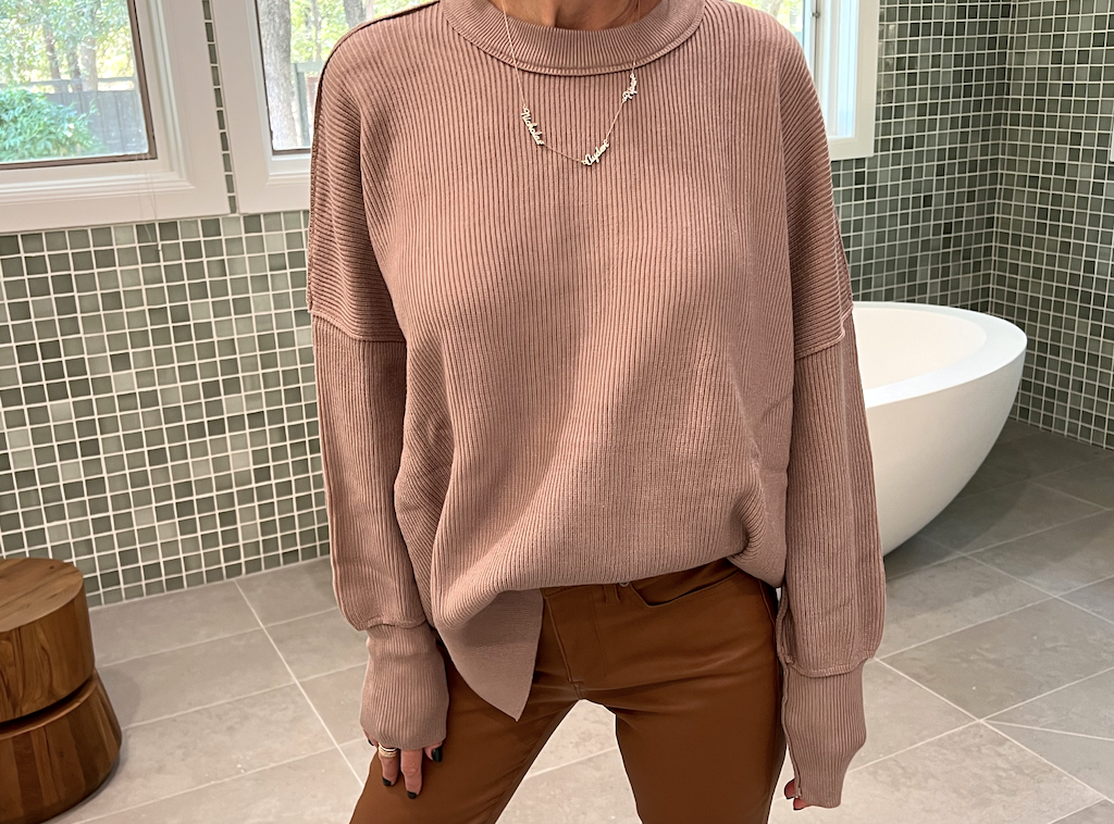 woman wearing Amazon sweater 