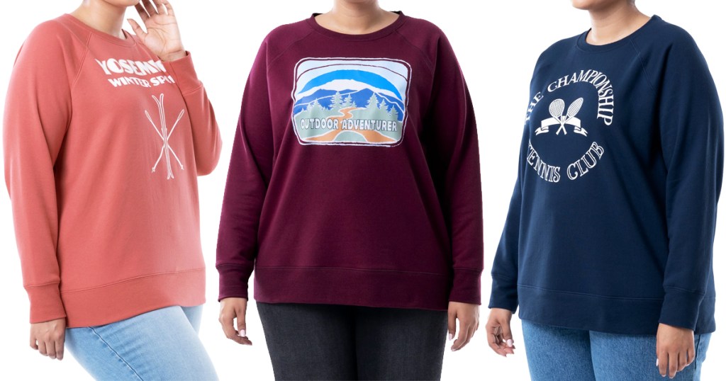 three women in graphic sweatshirts