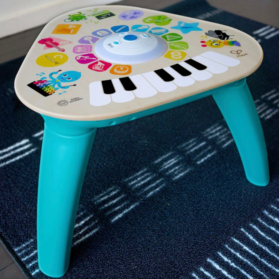 baby play table on blue rug