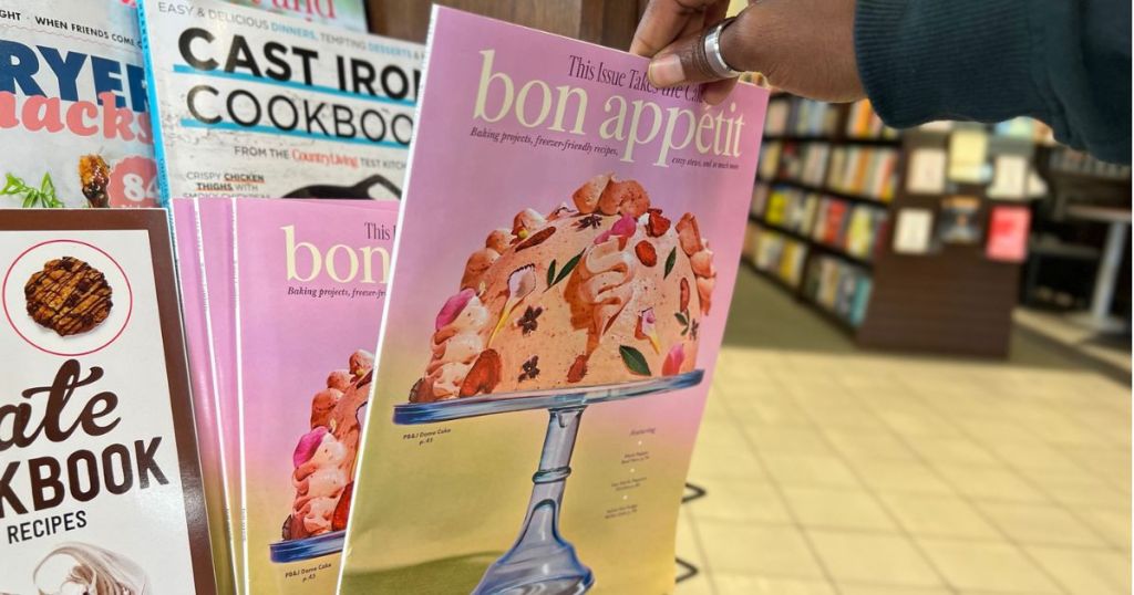 Hand grabbing a bon appetit magazine