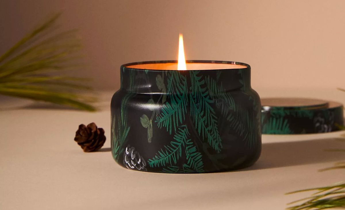 Capri Blue Fir &amp; Firewood Tin Candle stock image