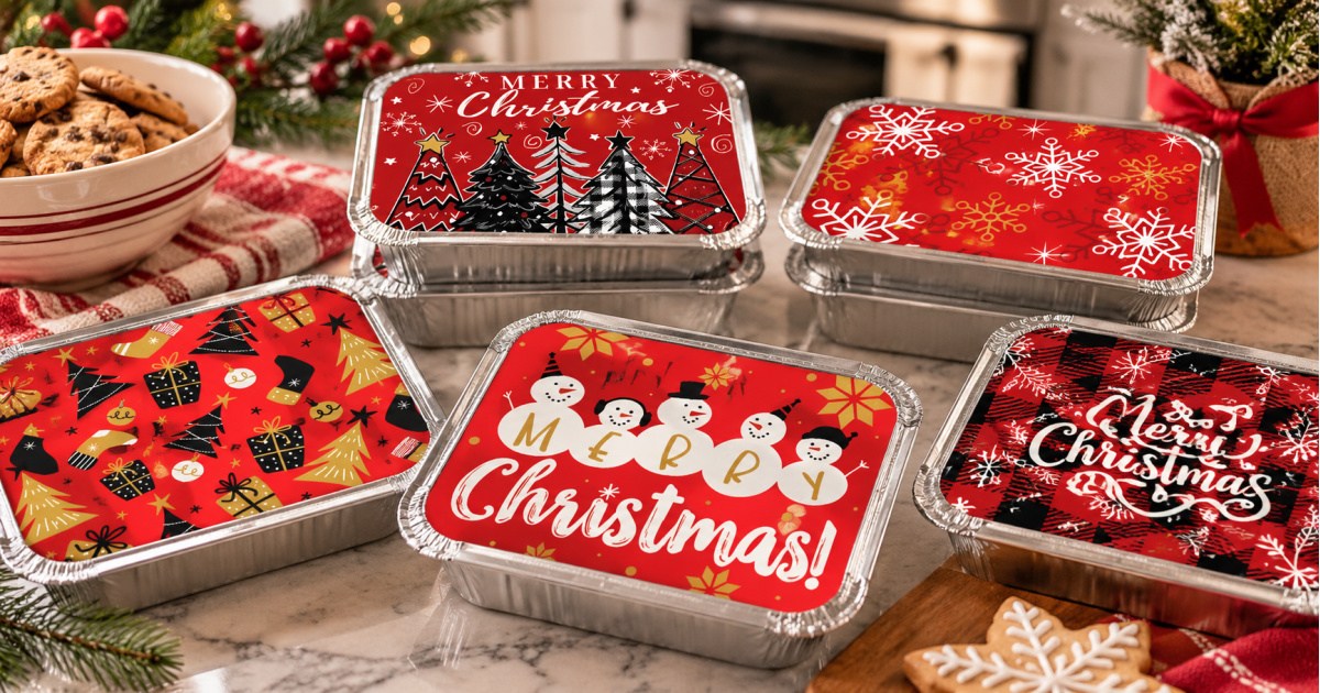 Christmas themed aluminum pans on kitchen tabletop