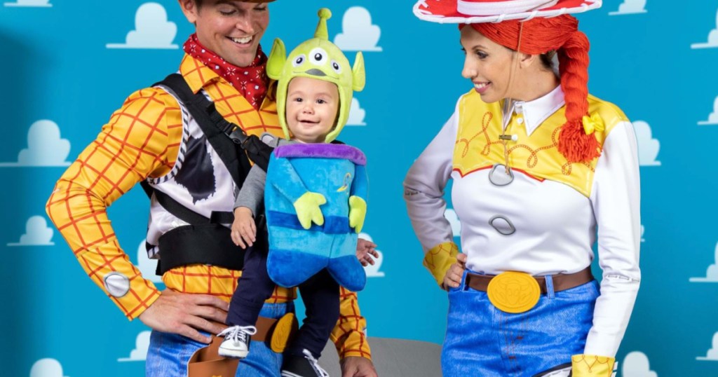 man dressed up as cowboy wearing Disney Little Space Men Baby Carrier Costume 