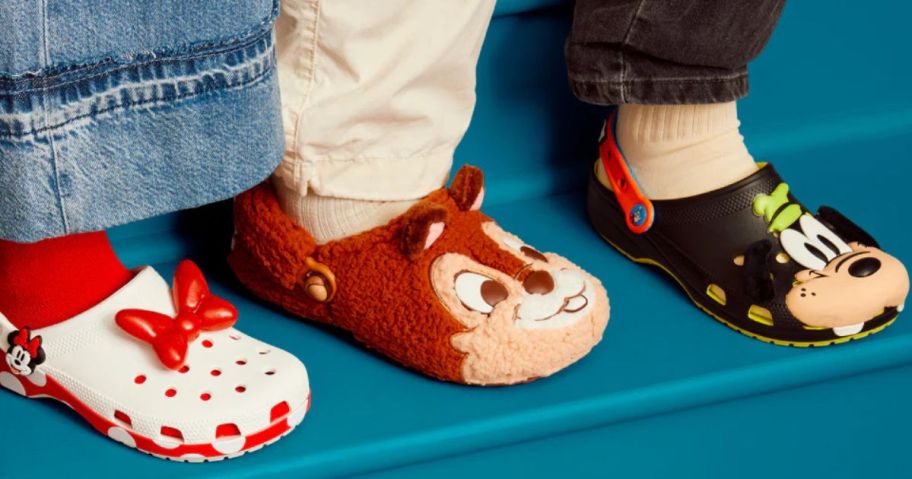 Feet wearing Disney Crocs