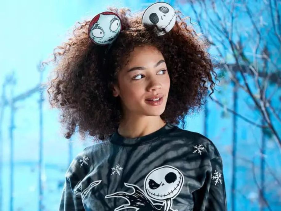 Woman wearing a pair of Nightmare Before Christmas Loungefly Ears Hedabnd